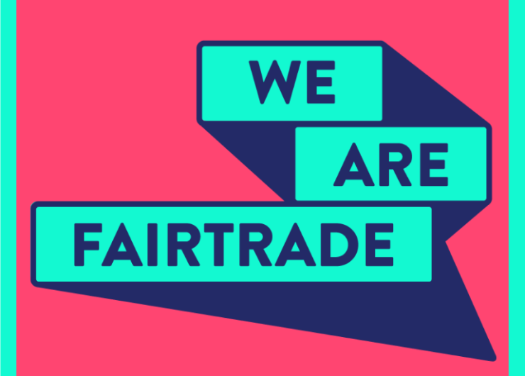 We Are Fairtrade logo with blue text on blue and pink background