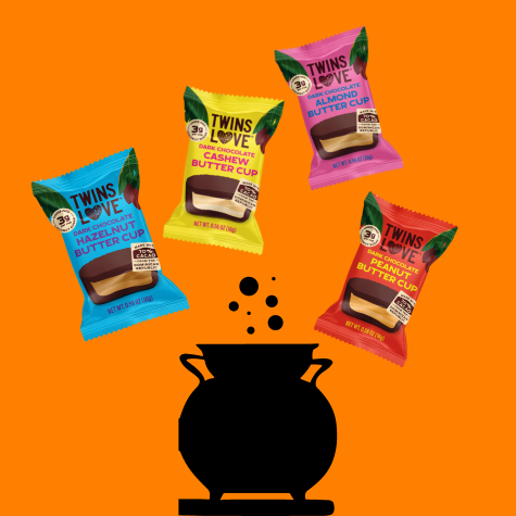 Hovering above a bubbling cauldron are four, individually wrapped chocolate nut butter cups from Twins Love Chocolate. All are made with dark chocolate, and the nut butter flavors are: almond, peanut butter, cashew, and hazelnut.